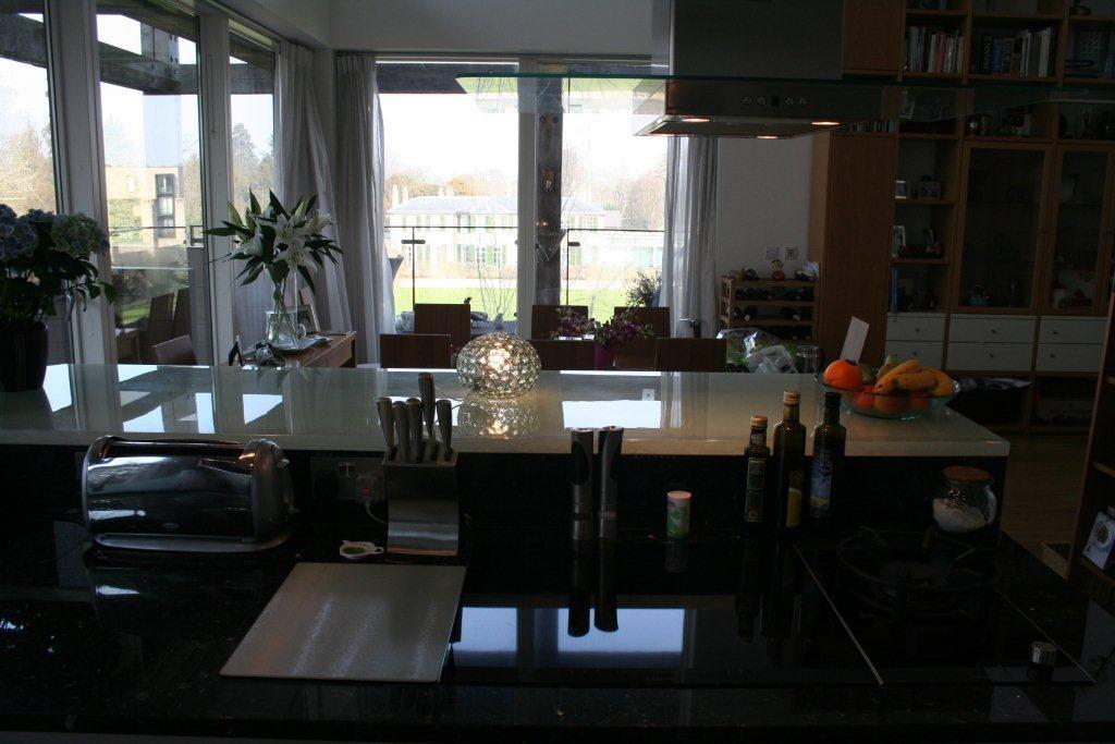 Atmos in glass, with Emerald Pearl — a Rational kitchen by Kitchensmiths, with granite worktops (photograph 4 of 8)