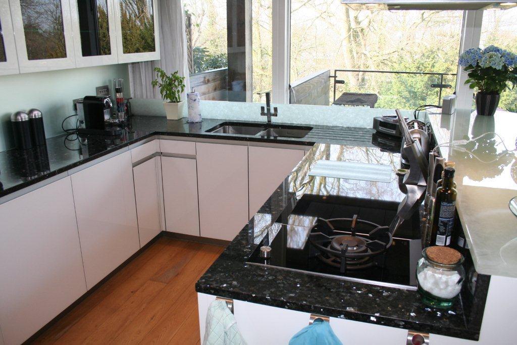 Atmos in glass, with Emerald Pearl — a Rational kitchen by Kitchensmiths, with granite worktops (photograph 7 of 8)