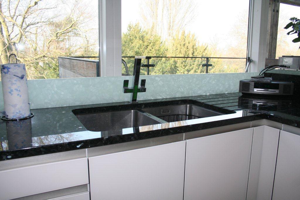 Atmos in glass, with Emerald Pearl — a Rational kitchen by Kitchensmiths, with granite worktops (photograph 8 of 8)