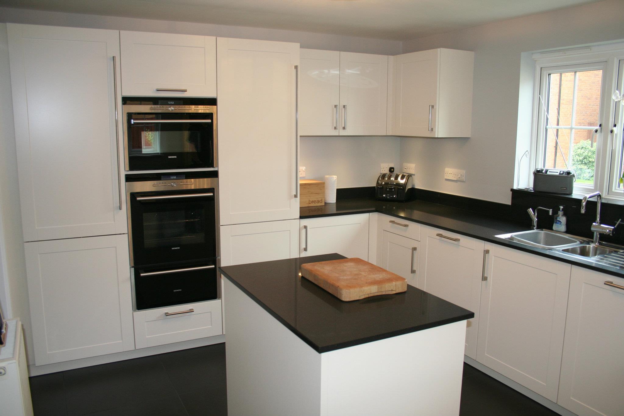 Cannes, in black Silestone — a Bauformat kitchen by Kitchensmiths, with silestone worktops (photograph 1 of 2)