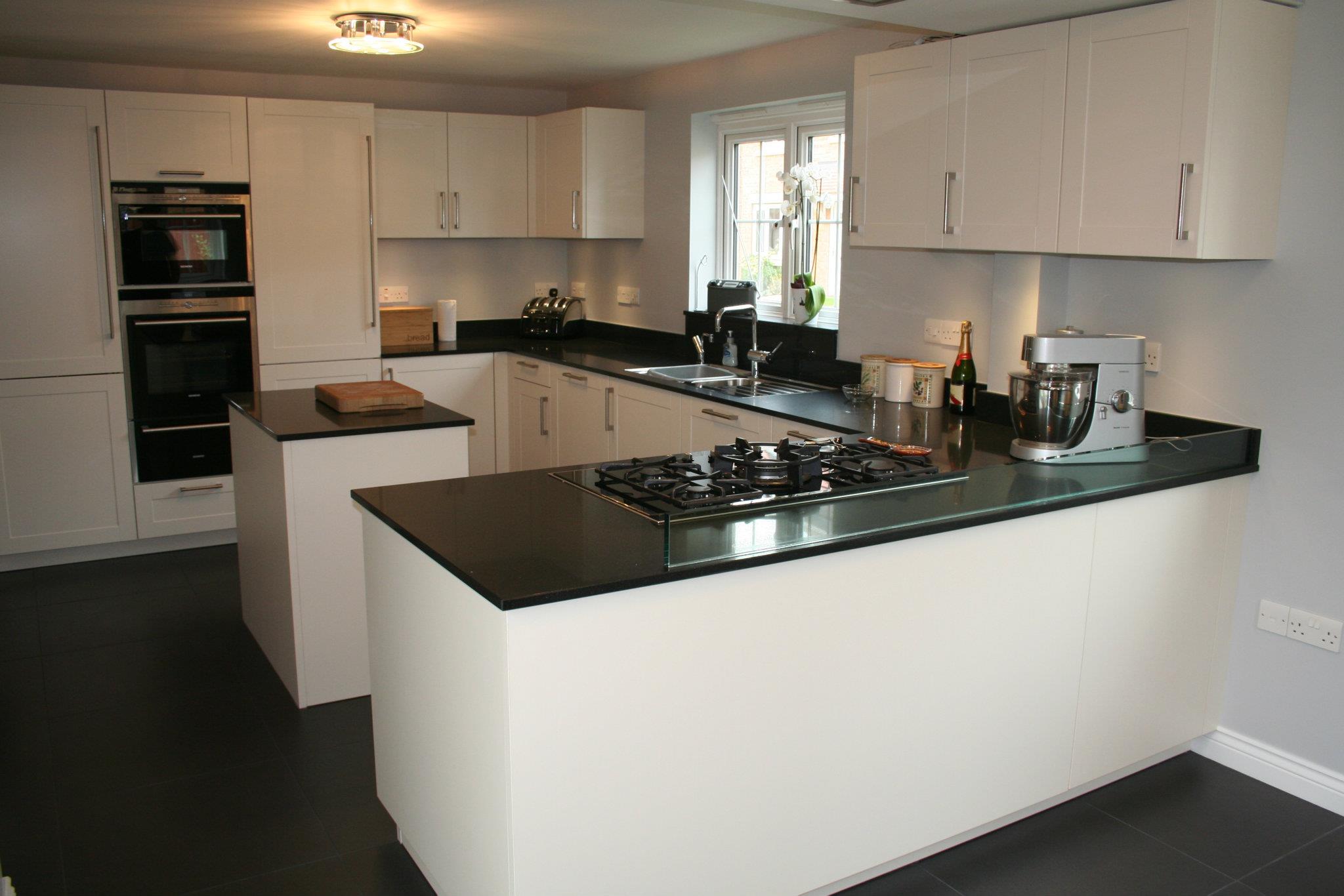 Cannes, in black Silestone — a Bauformat kitchen by Kitchensmiths, with silestone worktops (photograph 2 of 2)