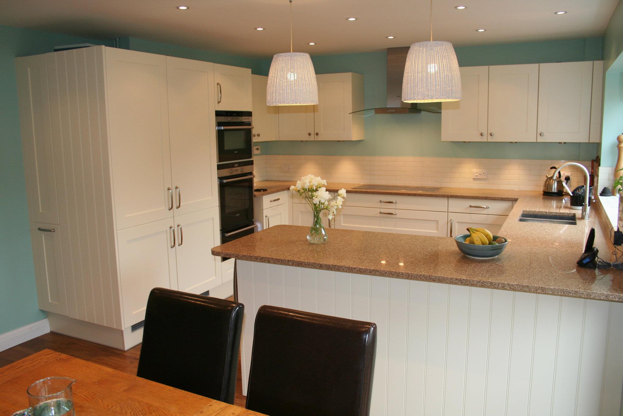 Edwardian, opening onto the garden — a Stoneham kitchen by Kitchensmiths (photograph 1 of 4)