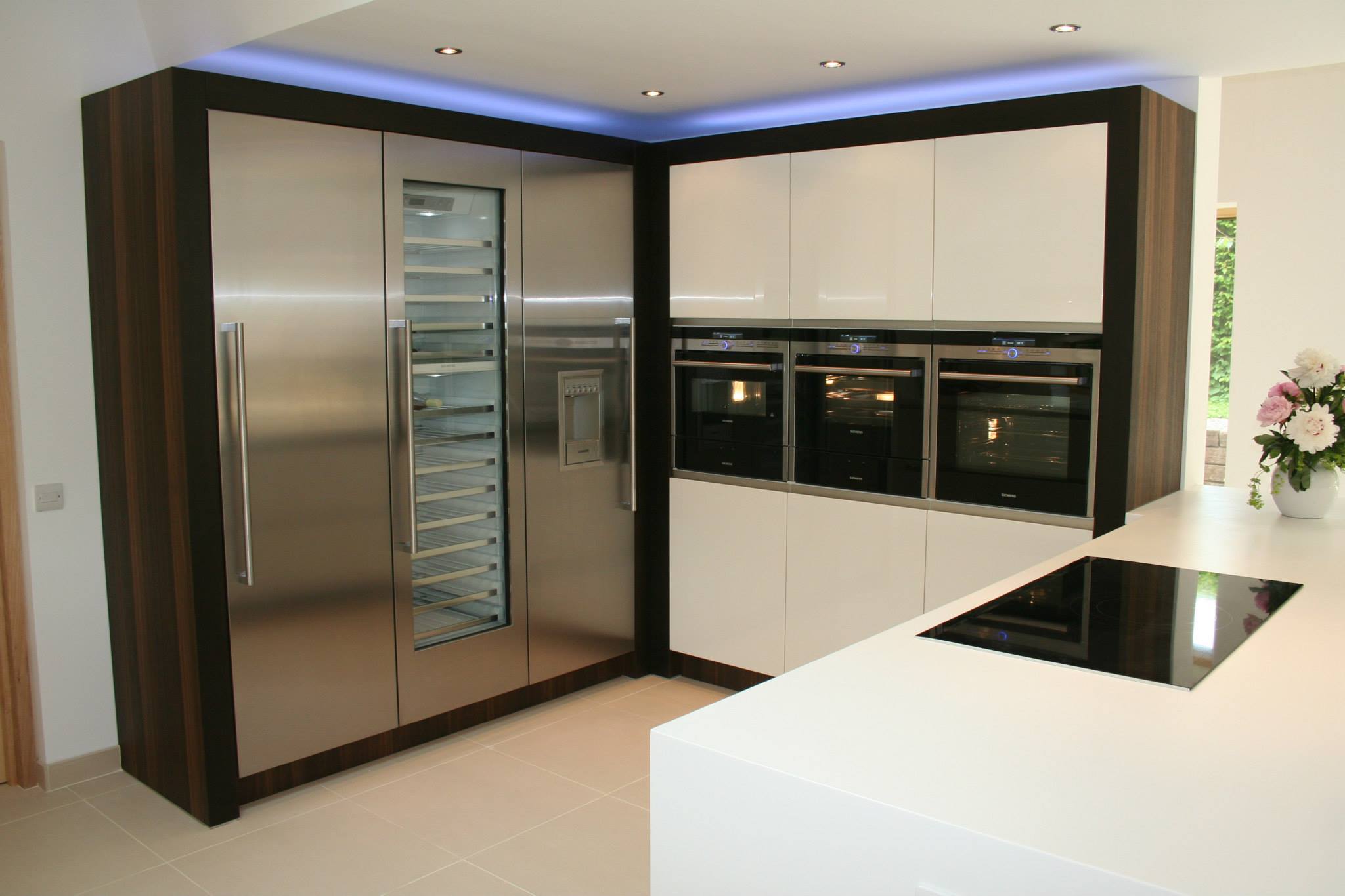 Atmos in high gloss white, with smoked oak — a Rational kitchen by Kitchensmiths (photograph 2 of 4)