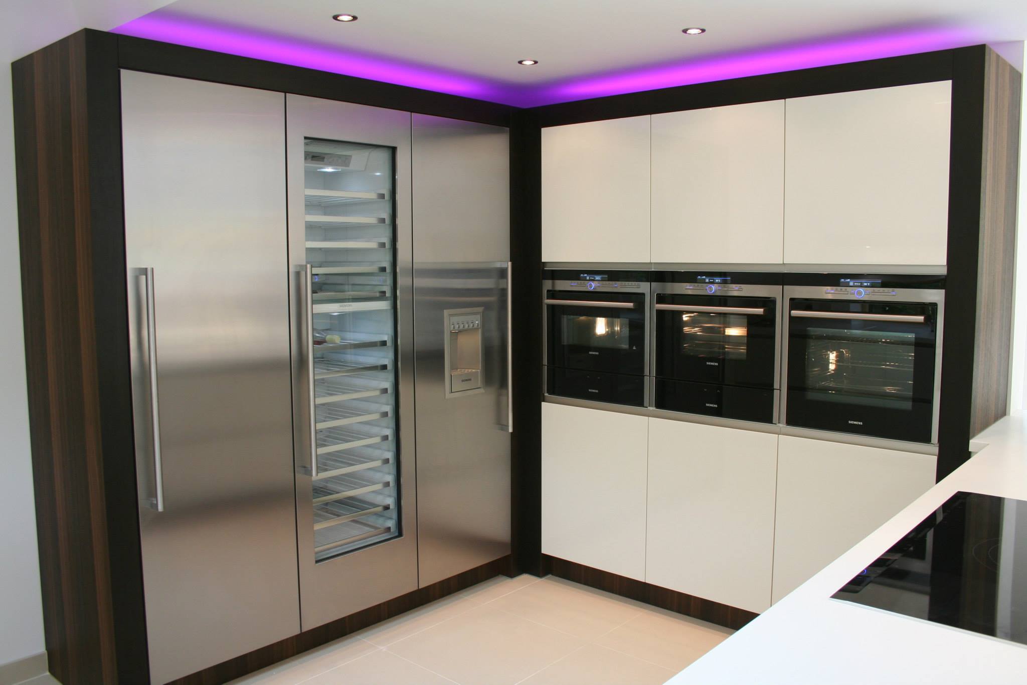 Atmos in high gloss white, with smoked oak — a Rational kitchen by Kitchensmiths (photograph 3 of 4)