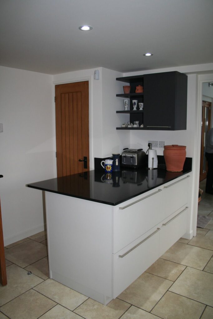 LANO in Natural and Blue, in Tilbrook — a Rational kitchen by Kitchensmiths, with silestone Negro Anubis worktops (photograph 2 of 3)