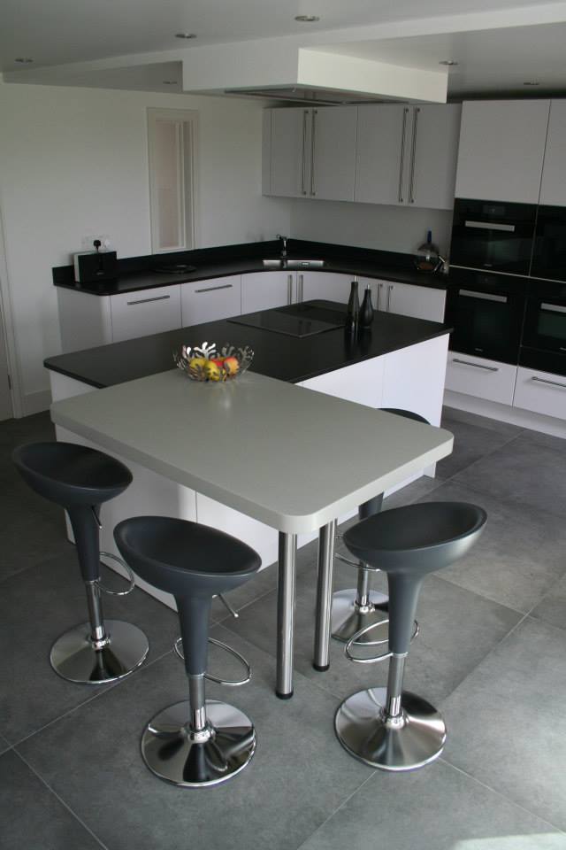 Fusion, and Deep Night Sky — a Stoneham kitchen by Kitchensmiths, with corian worktops (photograph 1 of 5)