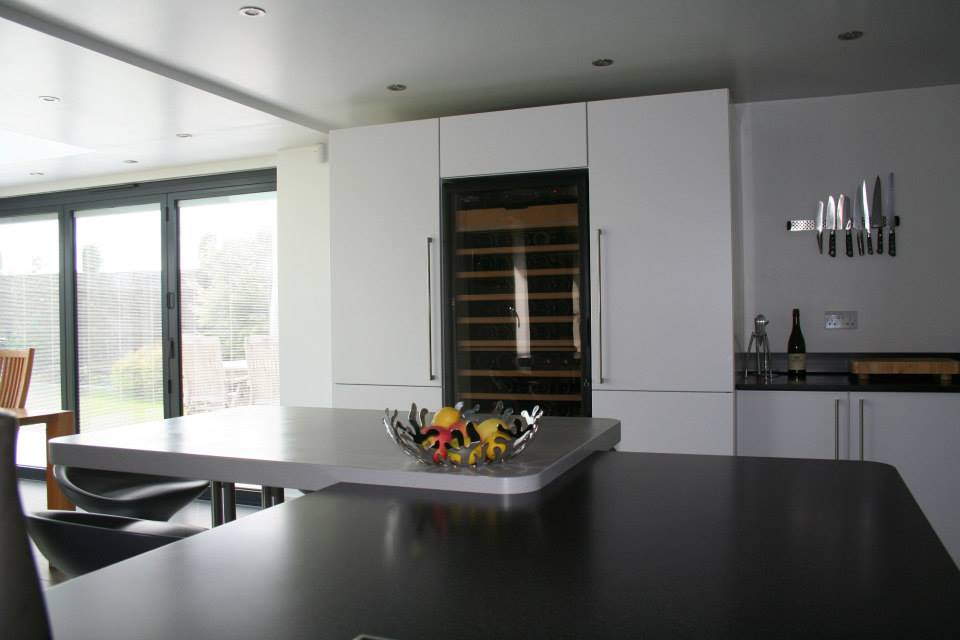 Fusion, and Deep Night Sky — a Stoneham kitchen by Kitchensmiths, with corian worktops (photograph 2 of 5)