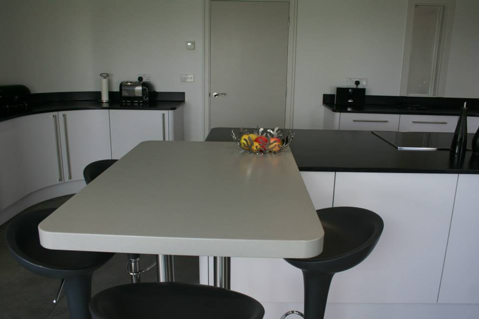 Fusion, and Deep Night Sky — a Stoneham kitchen by Kitchensmiths, with corian worktops (photograph 4 of 5)