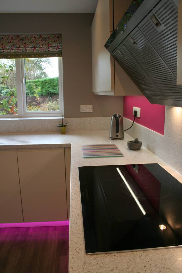 Solo in Polar White, with a splash of pink — a Rational kitchen by Kitchensmiths (photograph 2 of 3)