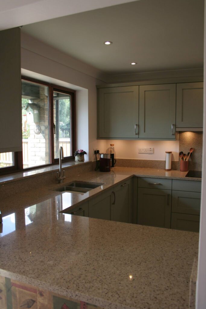 A custom-made door — a Stoneham kitchen by Kitchensmiths (photograph 1 of 3)