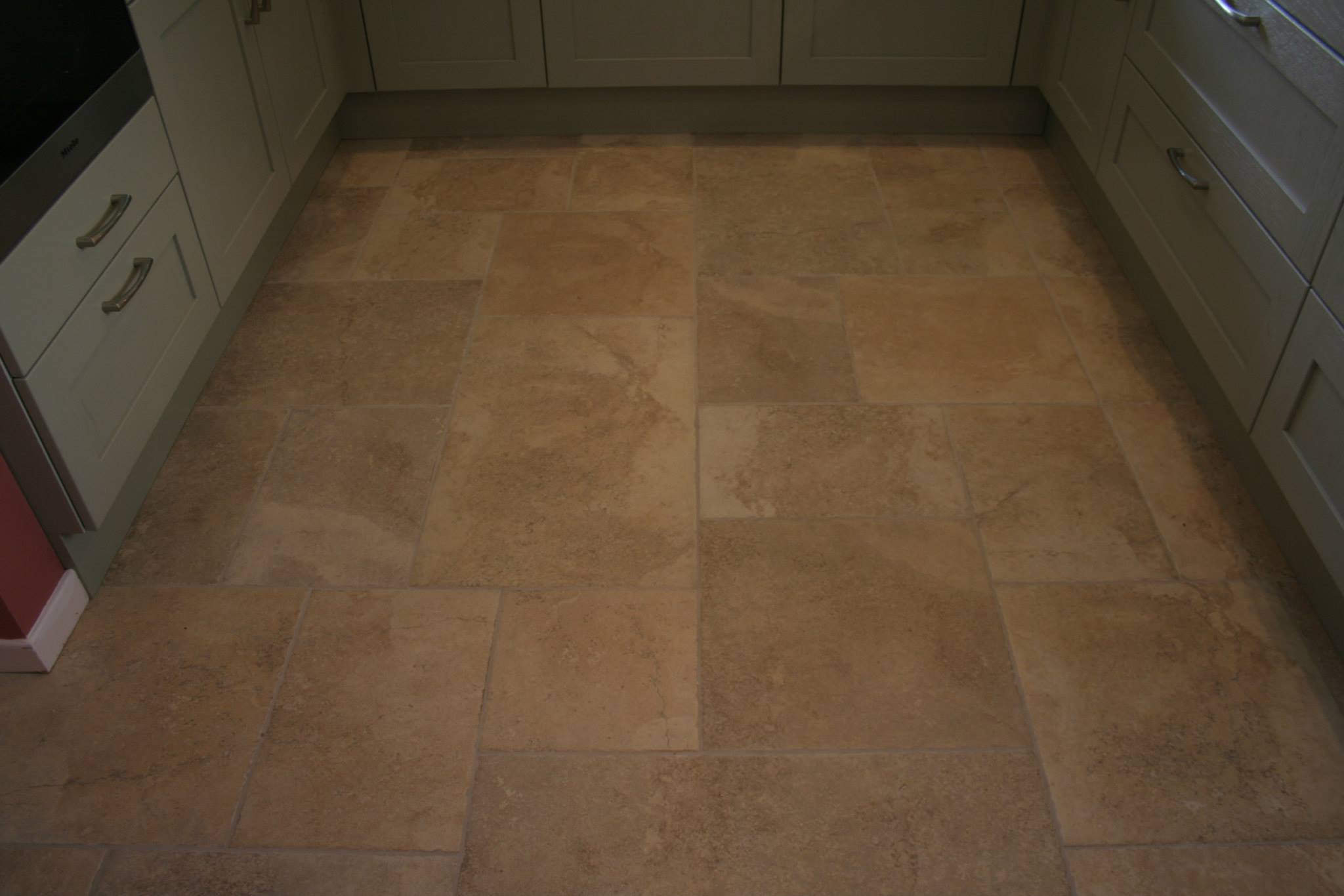 A custom-made door — a Stoneham kitchen by Kitchensmiths (photograph 3 of 3)