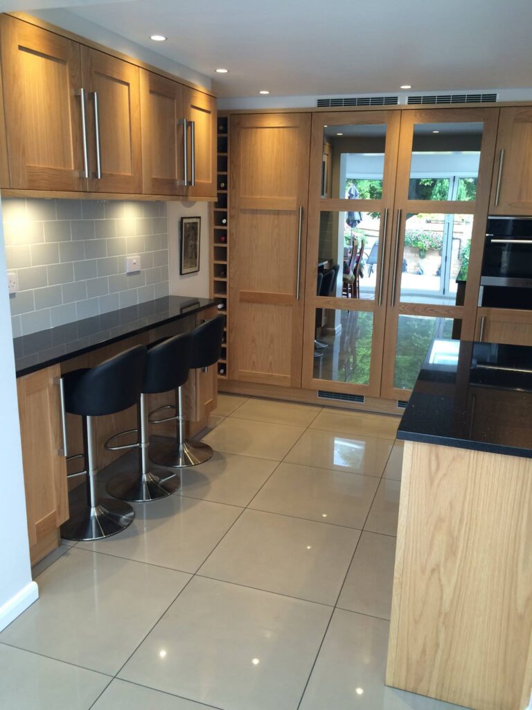 Aspen in light oak, under Star Galaxy — a Stoneham kitchen by Kitchensmiths (photograph 4 of 4)