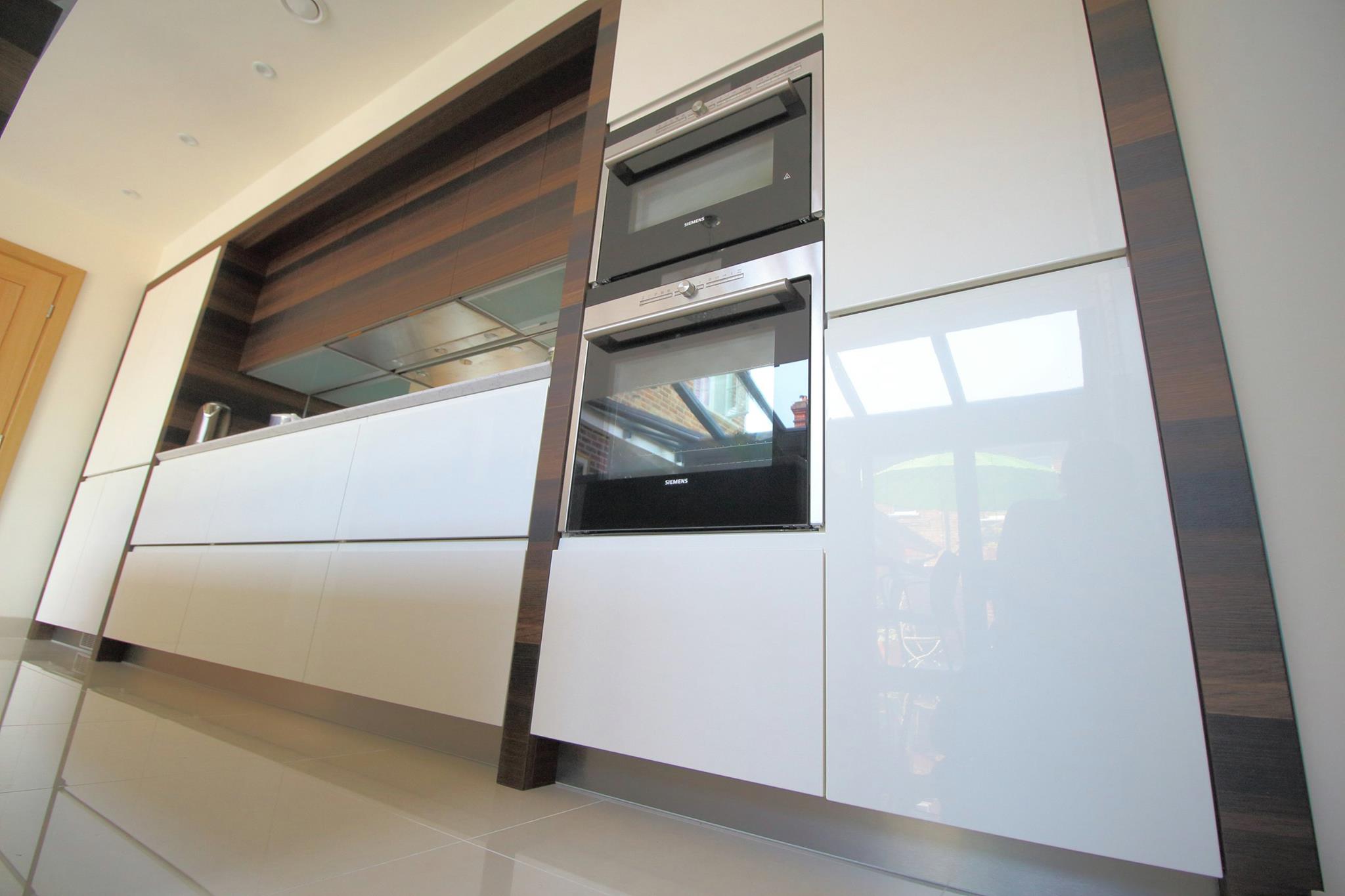 High gloss Solo and smoked oak, in Bedford — a Rational kitchen by Kitchensmiths, with silestone Lyra worktops (photograph 5 of 5)