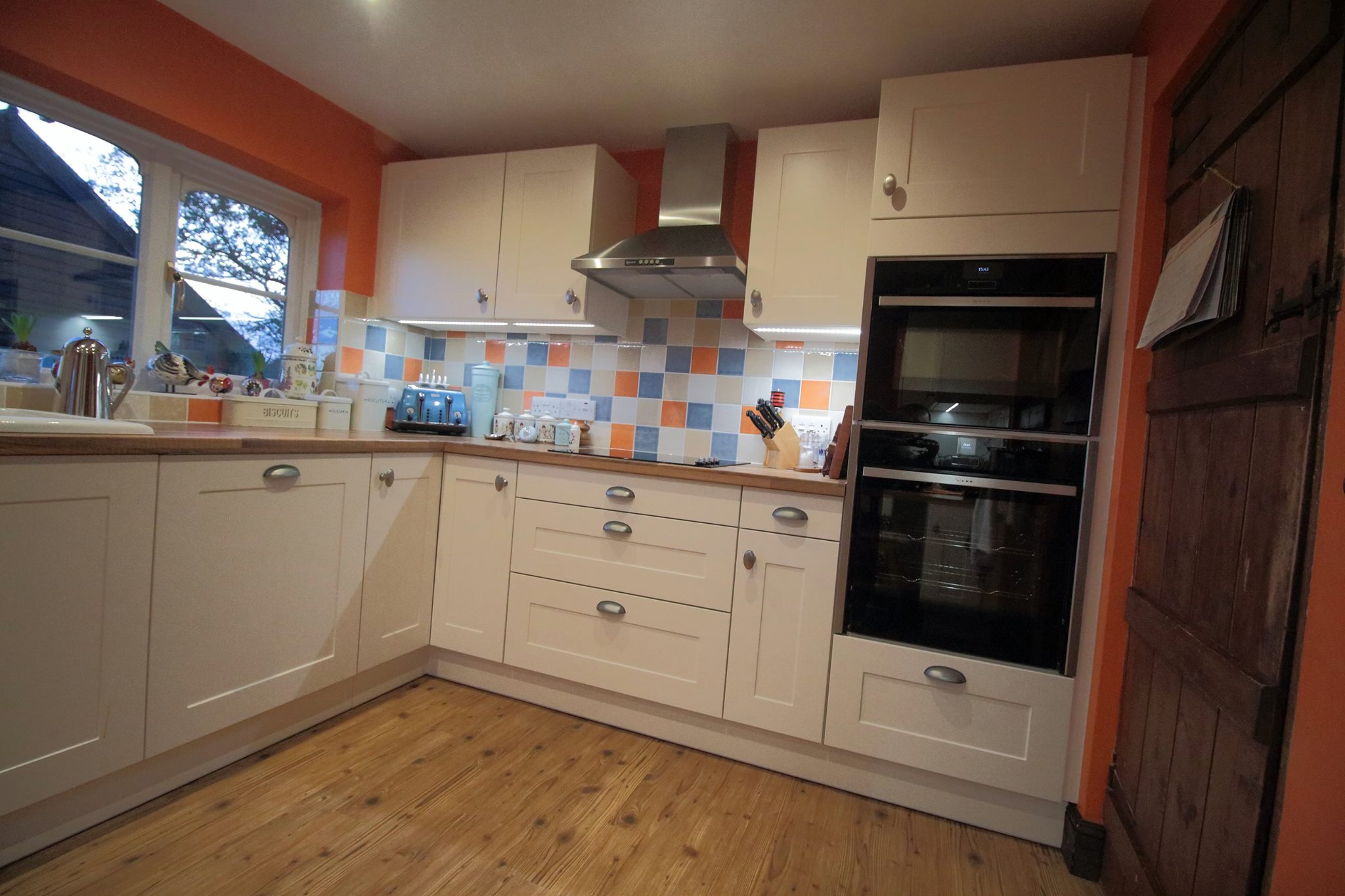 Magnolia shaker in Blyford — a kitchen by Kitchensmiths, with walnut worktops (photograph 3 of 4)