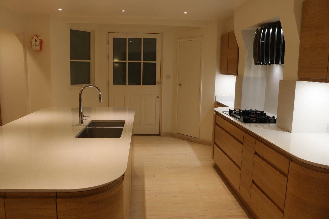 Flow in light oak — a Stoneham kitchen by Kitchensmiths, with silestone worktops (photograph 3 of 7)