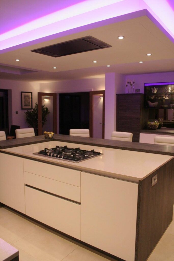 Handleless, fully specified — a kitchen by Kitchensmiths, with silestone worktops (photograph 6 of 8)