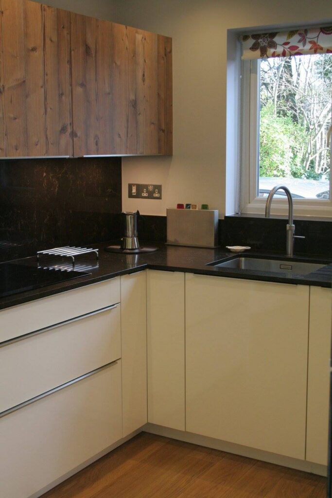 Puro, with Caesarstone Woodlands — a Rational kitchen by Kitchensmiths, with caesarstone Woodlands worktops (photograph 2 of 6)