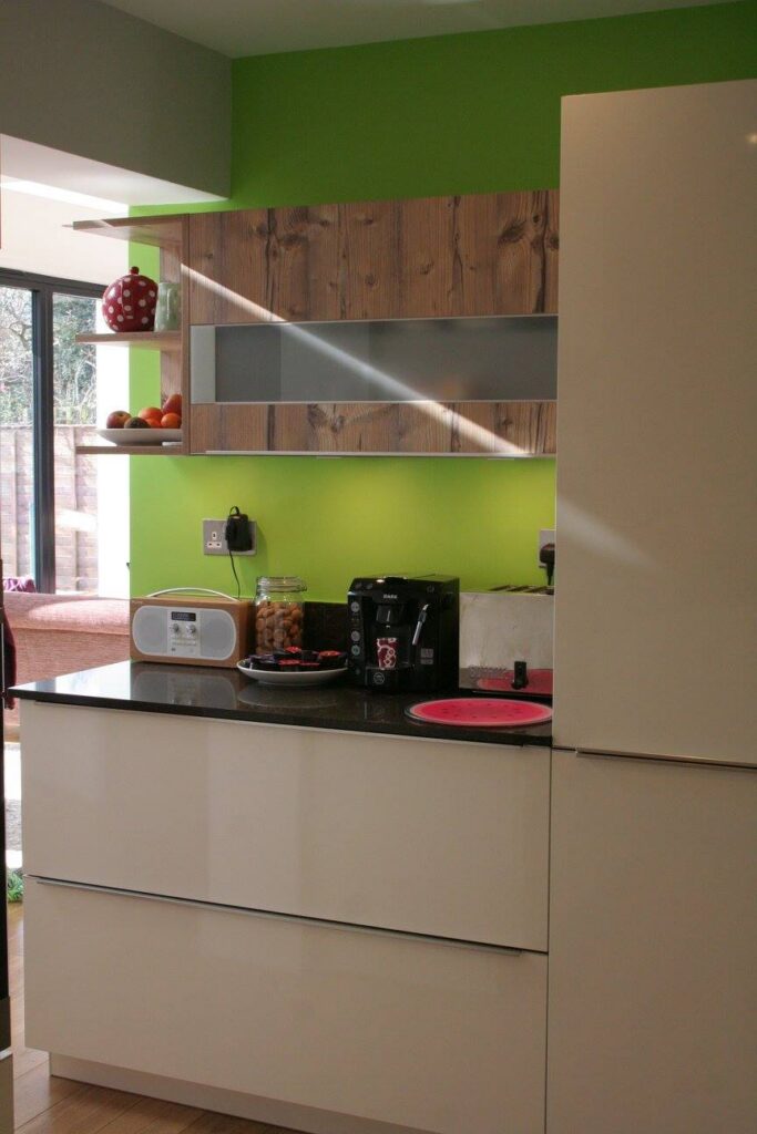 Puro, with Caesarstone Woodlands — a Rational kitchen by Kitchensmiths, with caesarstone Woodlands worktops (photograph 3 of 6)