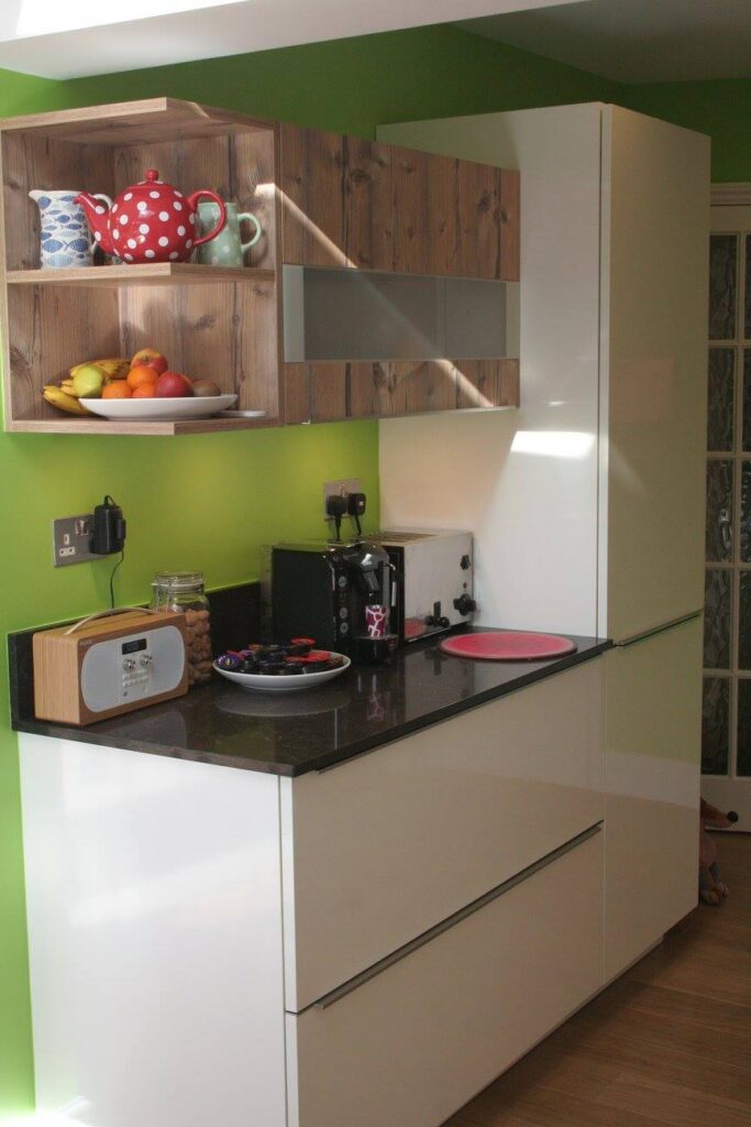Puro, with Caesarstone Woodlands — a Rational kitchen by Kitchensmiths, with caesarstone Woodlands worktops (photograph 4 of 6)