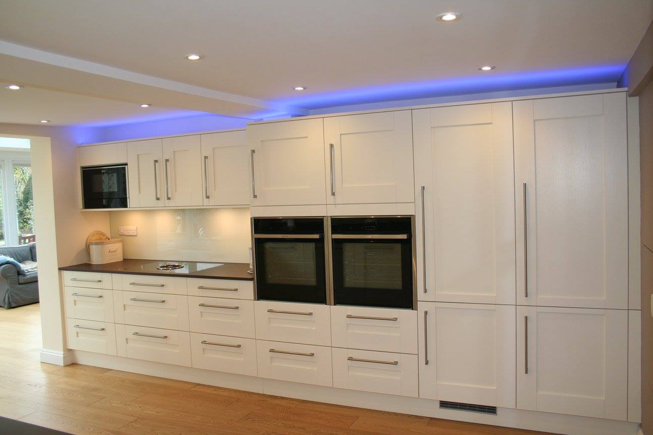 Traditional shaker, with colour-change lighting — a Stoneham kitchen by Kitchensmiths (photograph 1 of 8)