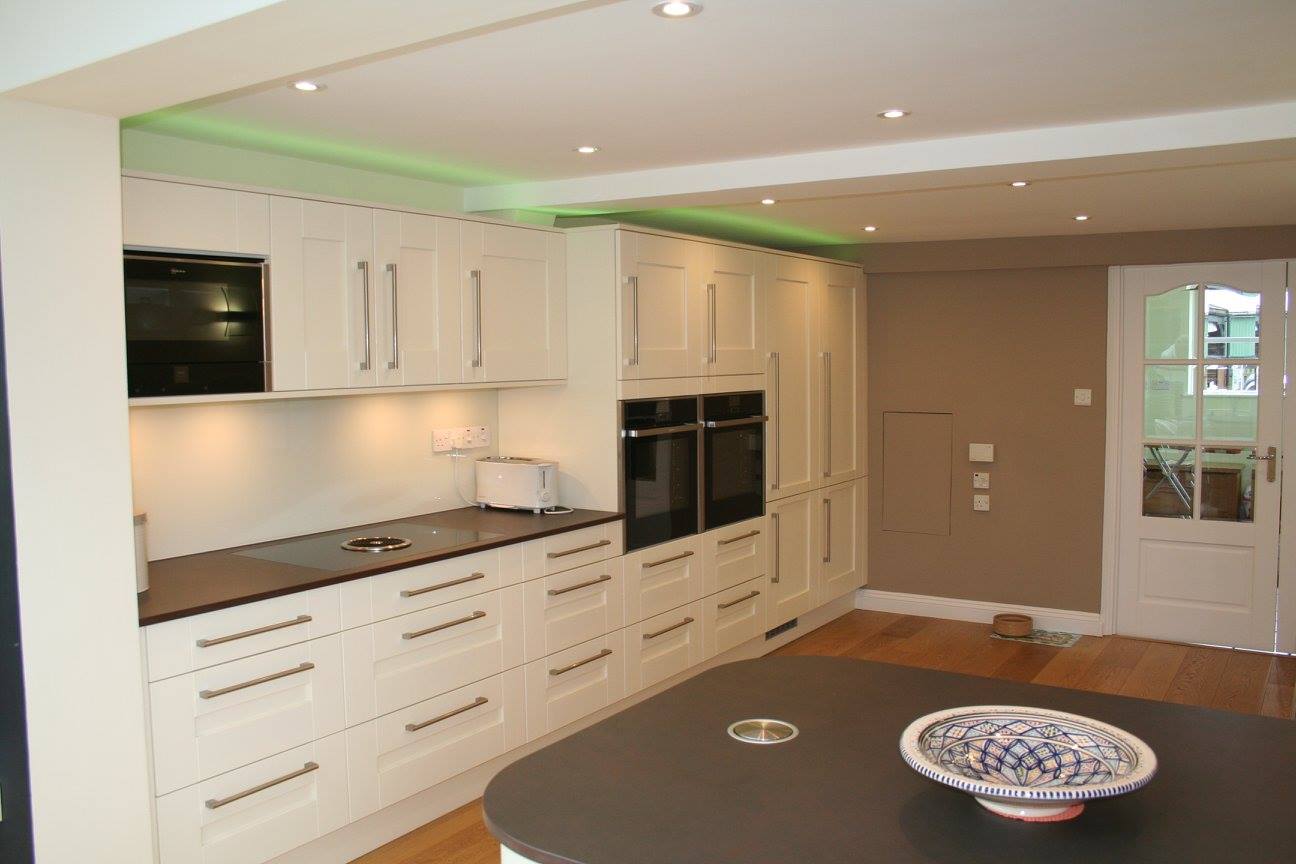 Traditional shaker, with colour-change lighting — a Stoneham kitchen by Kitchensmiths (photograph 6 of 8)