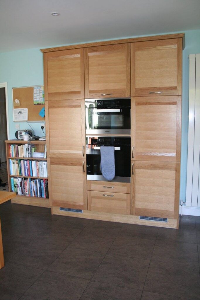 Strata, with Corian Fossil — a Stoneham kitchen by Kitchensmiths, with corian Fossil worktops (photograph 2 of 6)