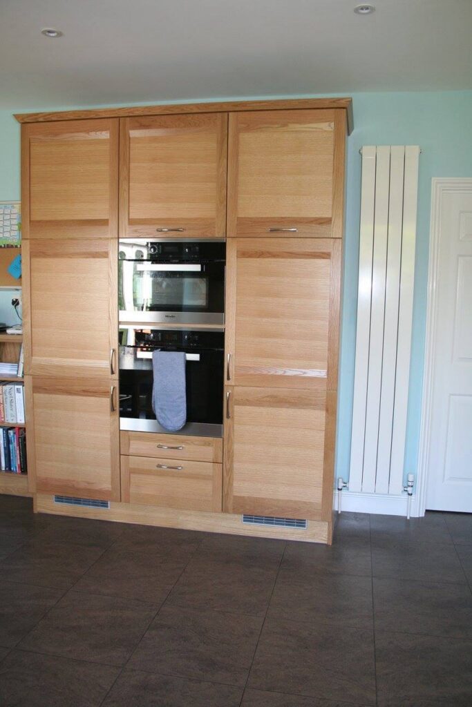 Strata, with Corian Fossil — a Stoneham kitchen by Kitchensmiths, with corian Fossil worktops (photograph 3 of 6)
