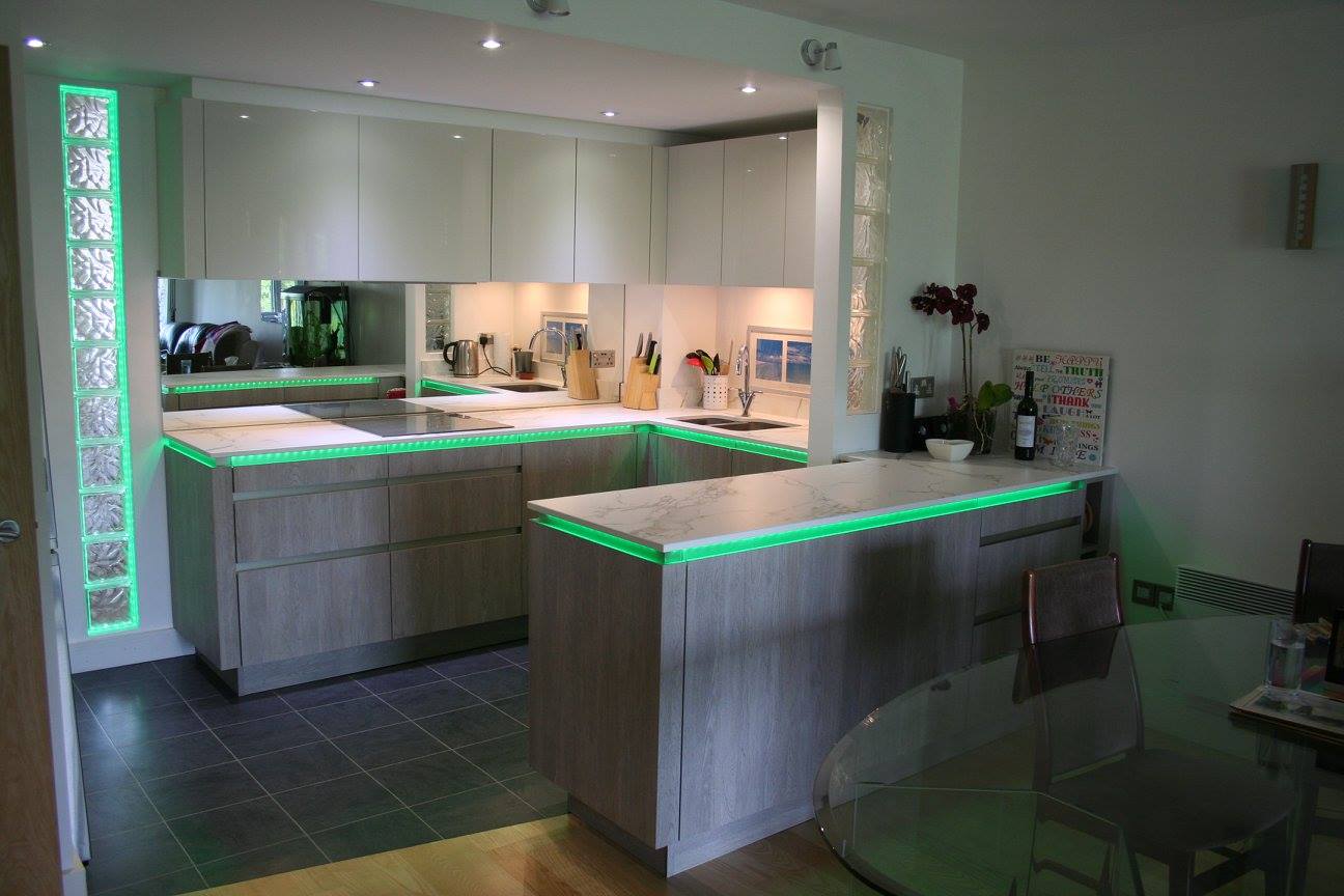 TIO, with Dekton Aura and feature lighting — a kitchen by Kitchensmiths, with dekton Aura worktops (photograph 1 of 5)
