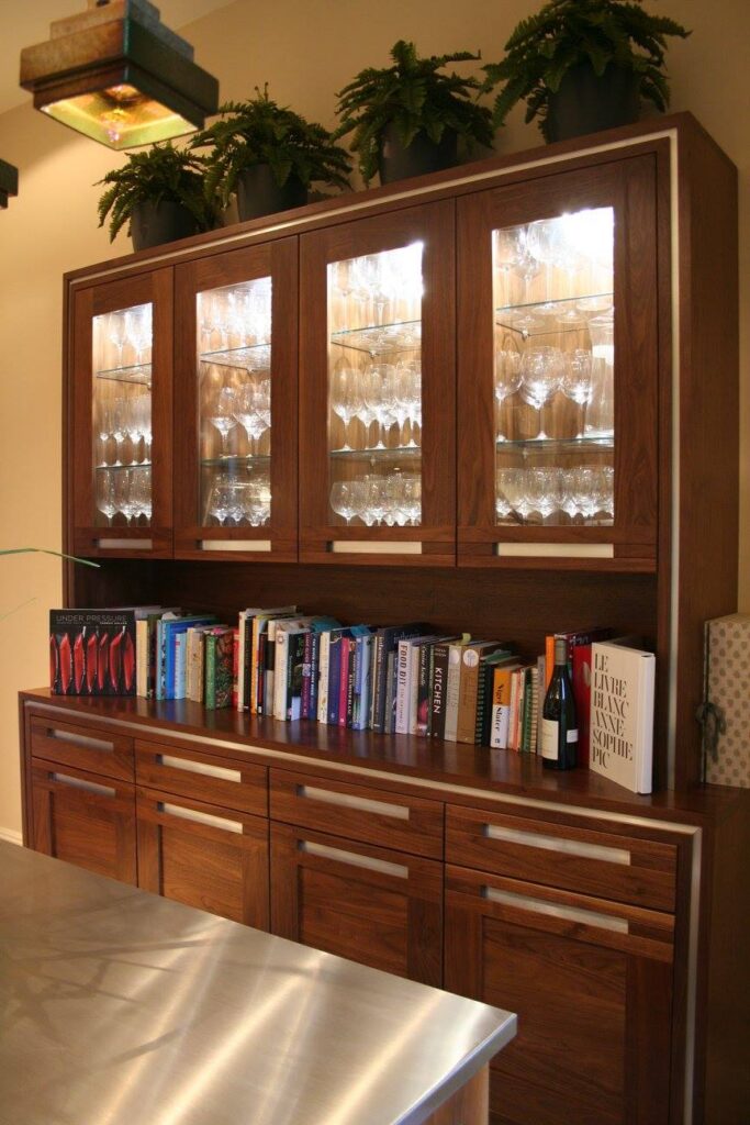 A dresser and an island — a Stoneham kitchen by Kitchensmiths, with stainless steel worktops (photograph 2 of 8)