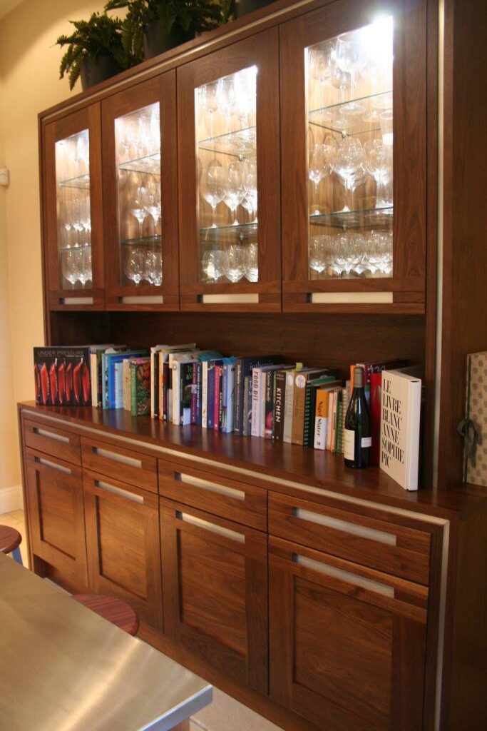A dresser and an island — a Stoneham kitchen by Kitchensmiths, with stainless steel worktops (photograph 3 of 8)