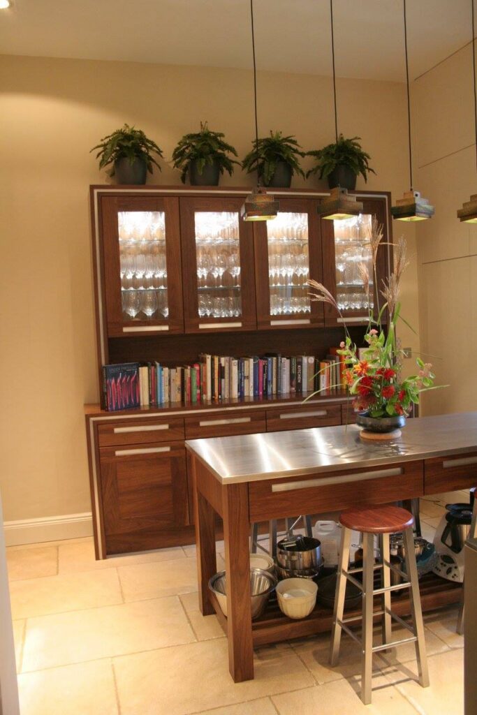 A dresser and an island — a Stoneham kitchen by Kitchensmiths, with stainless steel worktops (photograph 6 of 8)