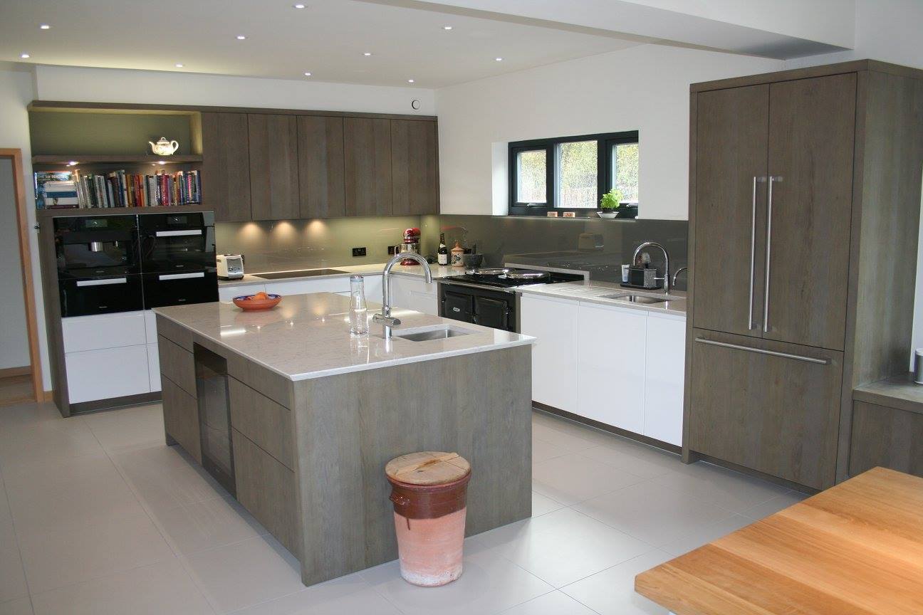 High gloss white with terra oak — a Rational kitchen by Kitchensmiths (photograph 1 of 8)