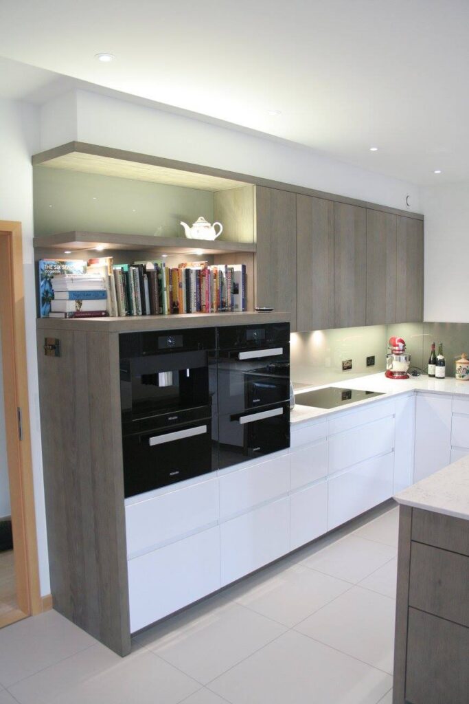 High gloss white with terra oak — a Rational kitchen by Kitchensmiths (photograph 2 of 8)