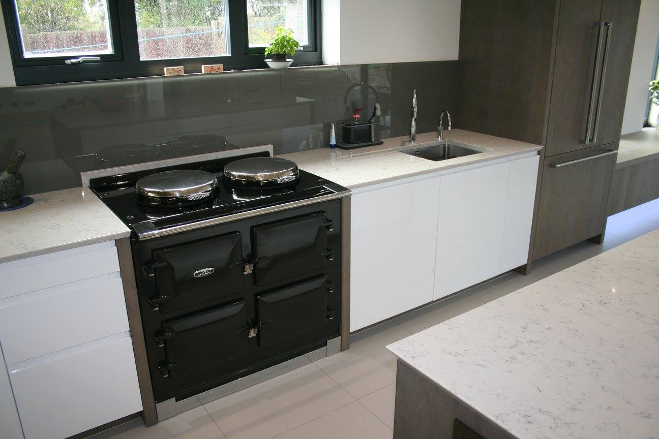 High gloss white with terra oak — a Rational kitchen by Kitchensmiths (photograph 3 of 8)