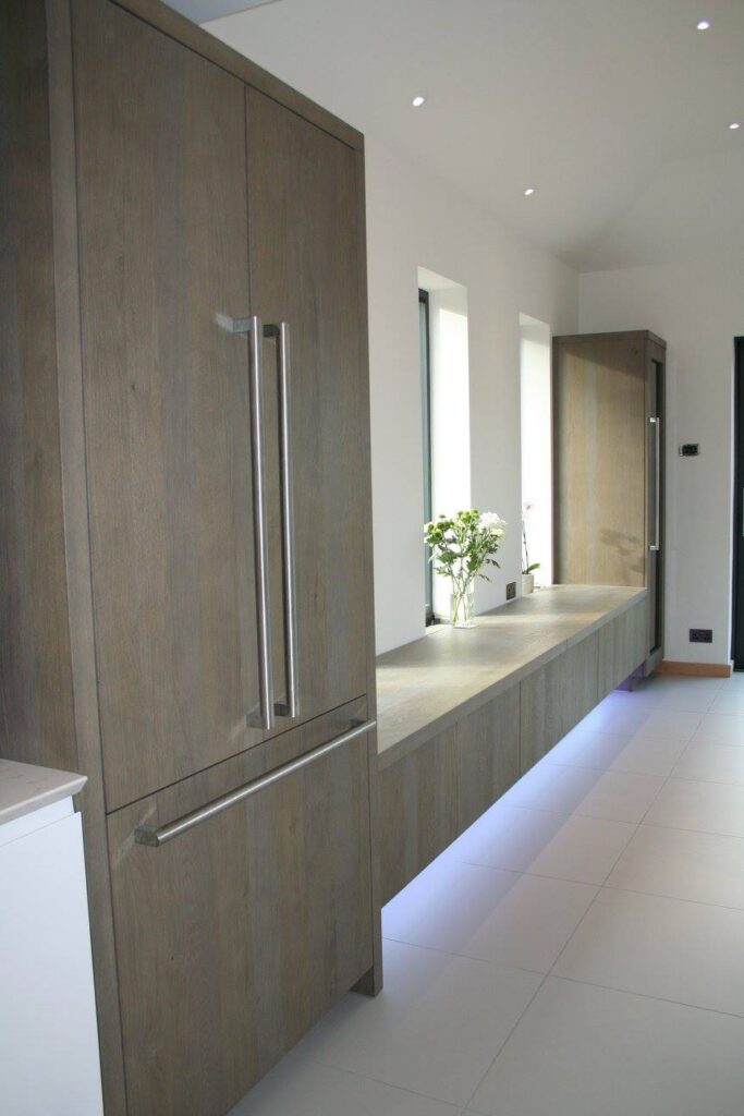 High gloss white with terra oak — a Rational kitchen by Kitchensmiths (photograph 6 of 8)