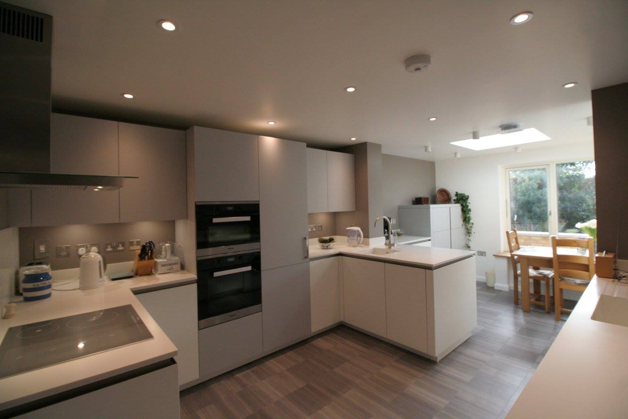 TIO in Polar White — a Rational kitchen by Kitchensmiths, with corian worktops (photograph 3 of 8)