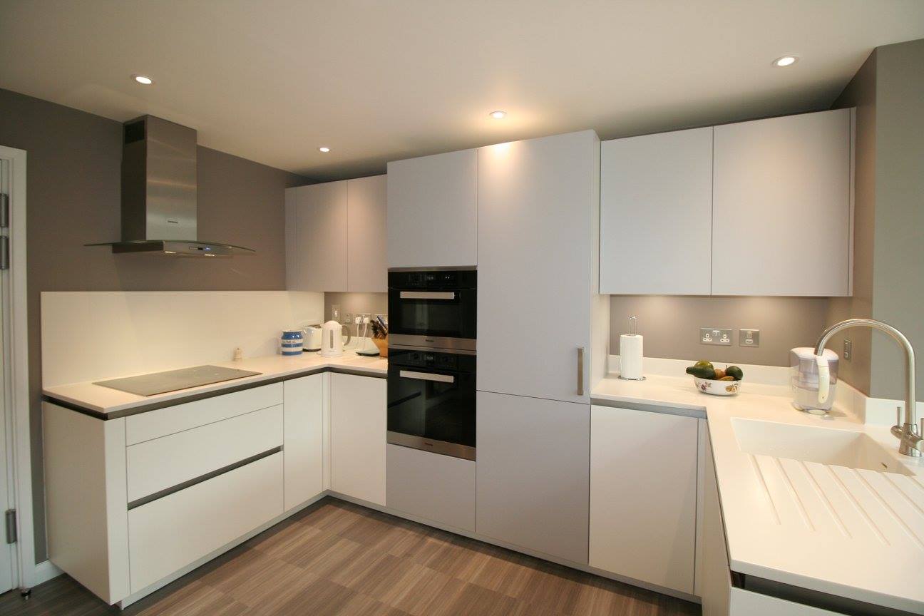 TIO in Polar White — a Rational kitchen by Kitchensmiths, with corian worktops (photograph 4 of 8)