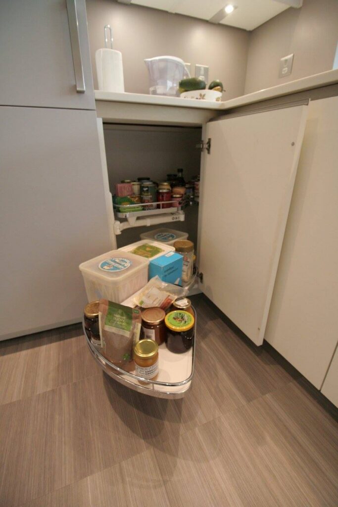 TIO in Polar White — a Rational kitchen by Kitchensmiths, with corian worktops (photograph 7 of 8)