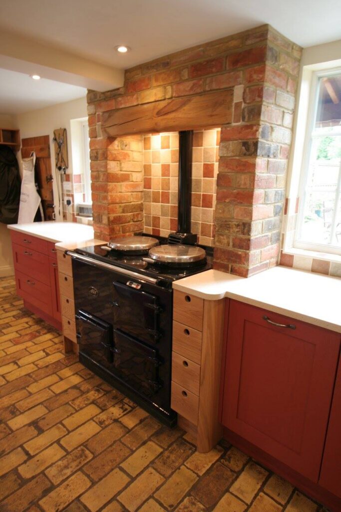 Cottage style, in Aspen — a Stoneham kitchen by Kitchensmiths, with silestone worktops (photograph 1 of 4)