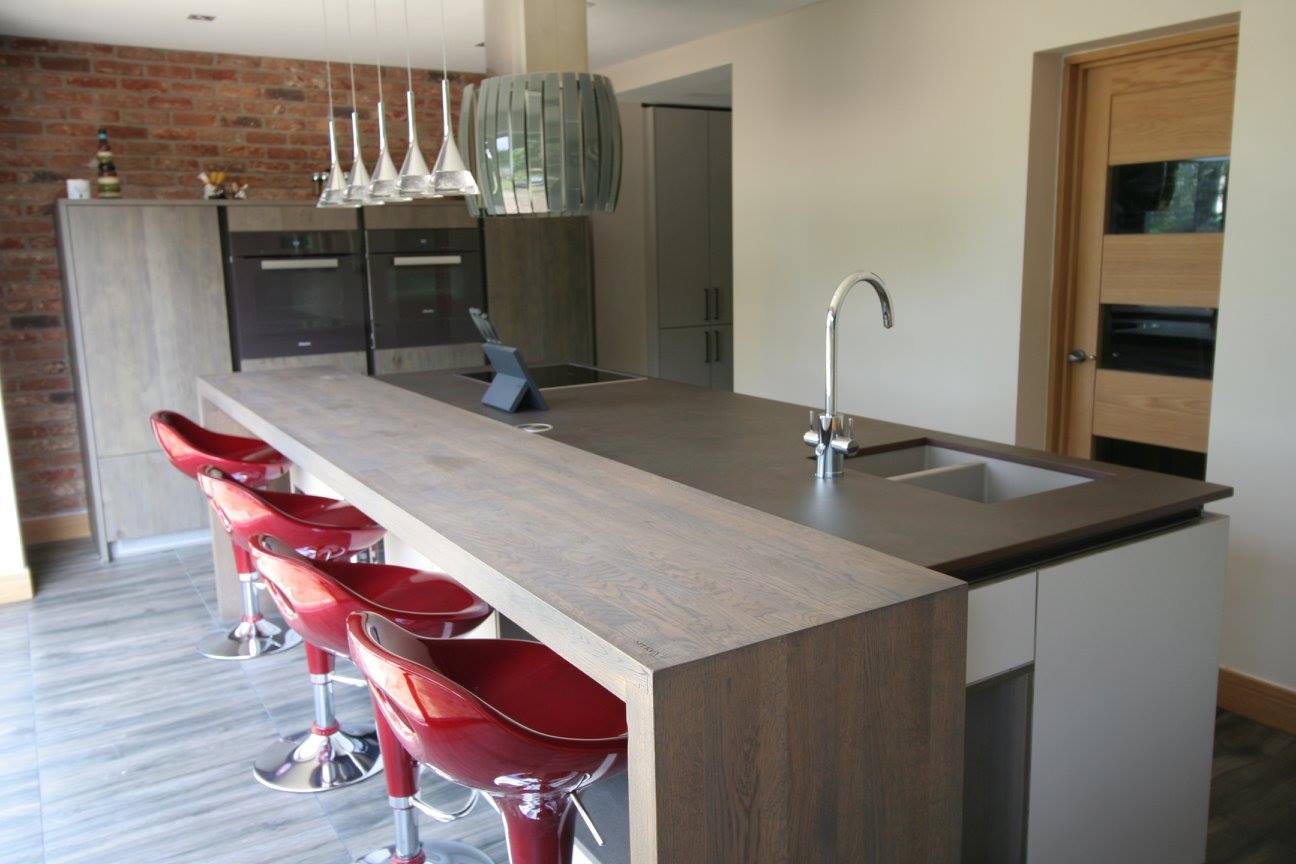 Sleek German kitchen with Dekton worktops — a kitchen by Kitchensmiths, with dekton worktops (photograph 2 of 16)