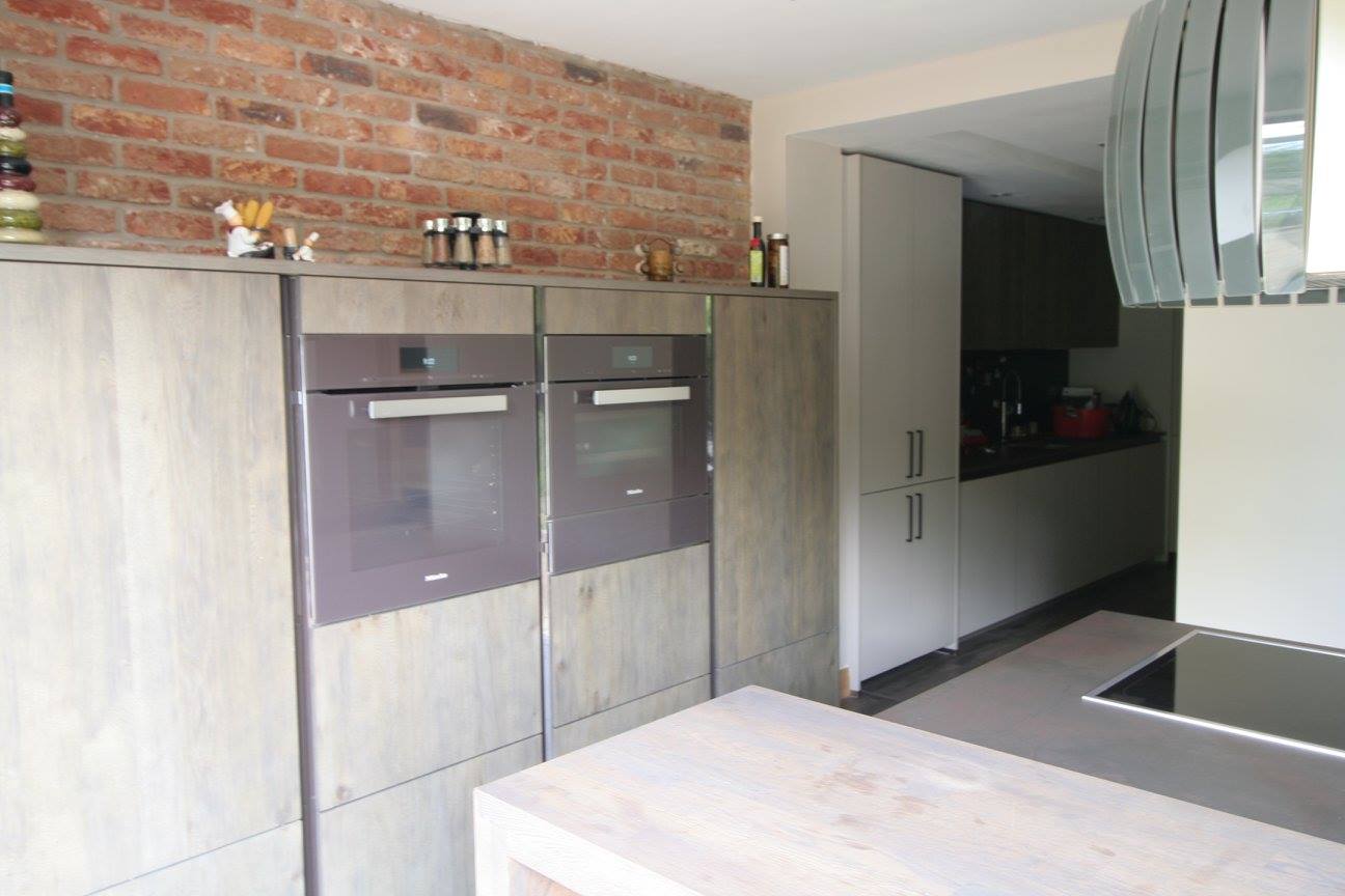 Sleek German kitchen with Dekton worktops — a kitchen by Kitchensmiths, with dekton worktops (photograph 3 of 16)