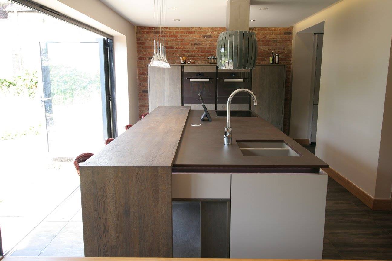 Sleek German kitchen with Dekton worktops — a kitchen by Kitchensmiths, with dekton worktops (photograph 5 of 16)