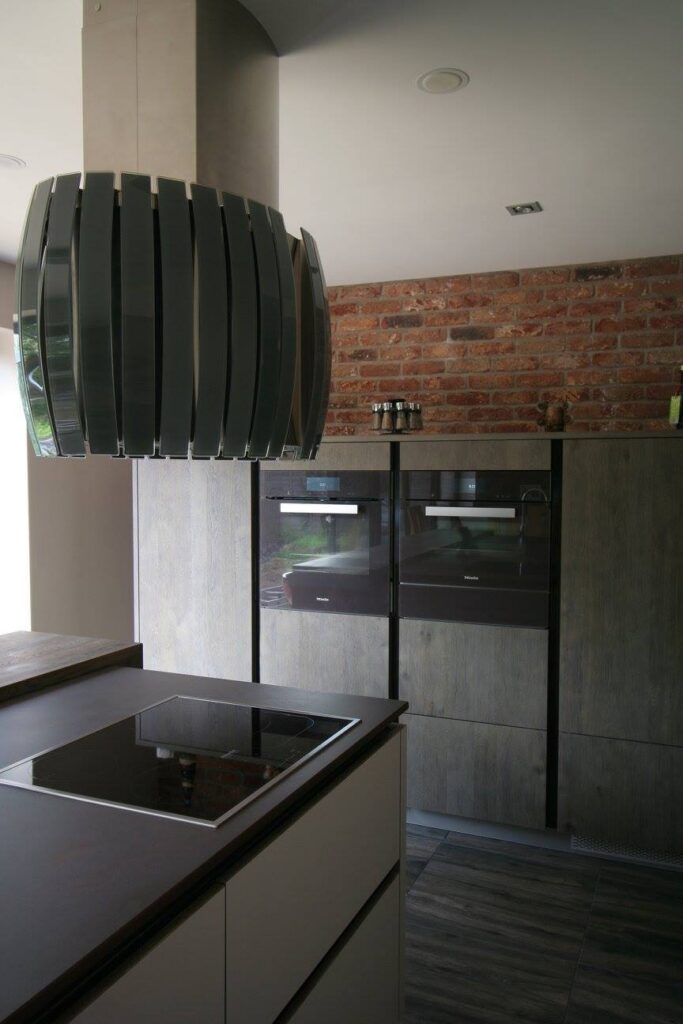 Sleek German kitchen with Dekton worktops — a kitchen by Kitchensmiths, with dekton worktops (photograph 8 of 16)