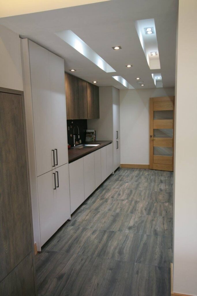 Sleek German kitchen with Dekton worktops — a kitchen by Kitchensmiths, with dekton worktops (photograph 14 of 16)
