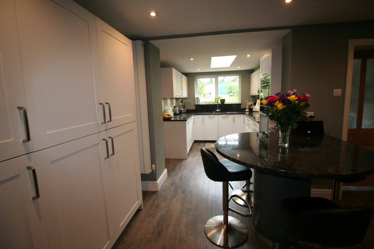 White shaker, steel grey granite — a Störmer kitchen by Kitchensmiths (photograph 1 of 7)