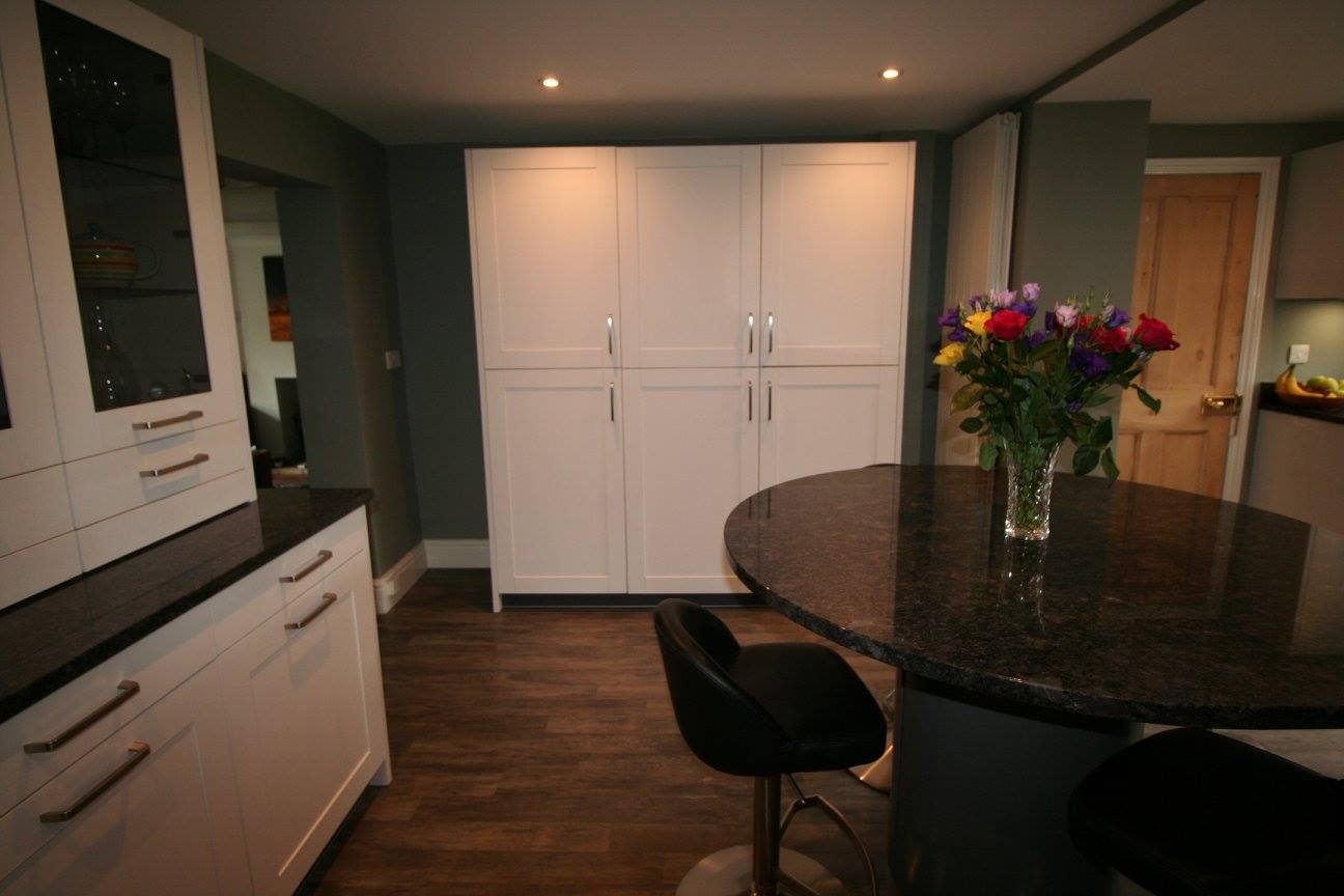 White shaker, steel grey granite — a Störmer kitchen by Kitchensmiths (photograph 7 of 7)