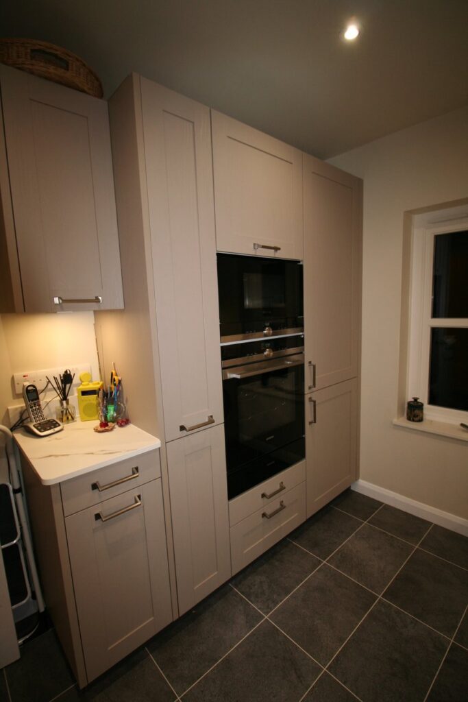Bristol in Ash Stone Grey — a Störmer kitchen by Kitchensmiths, with dekton Kairos worktops (photograph 2 of 2)