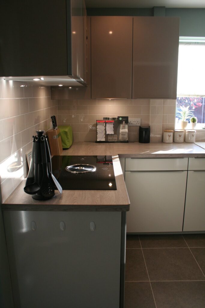 Puro in Natural High Gloss — a Rational kitchen by Kitchensmiths, with oak worktops (photograph 1 of 3)