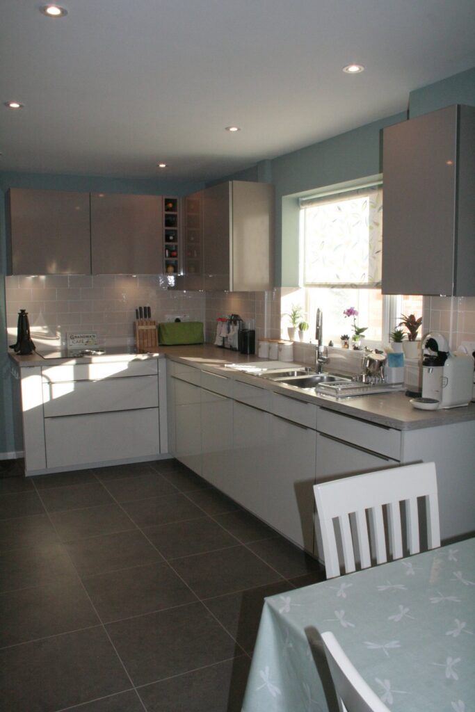 Puro in Natural High Gloss — a Rational kitchen by Kitchensmiths, with oak worktops (photograph 3 of 3)