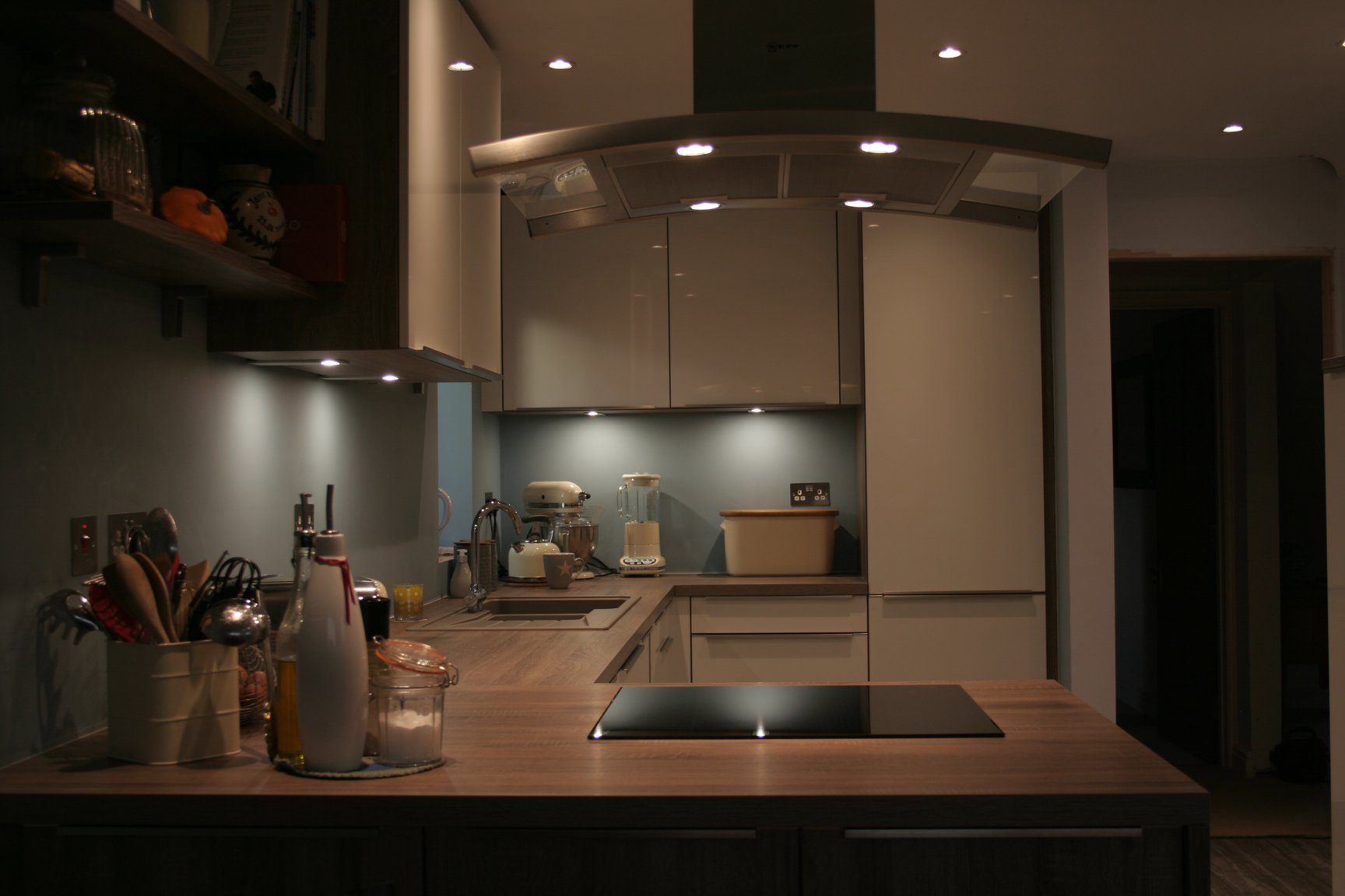 Como High Gloss White, with dark oak — a Störmer kitchen by Kitchensmiths, with oak worktops (photograph 1 of 8)